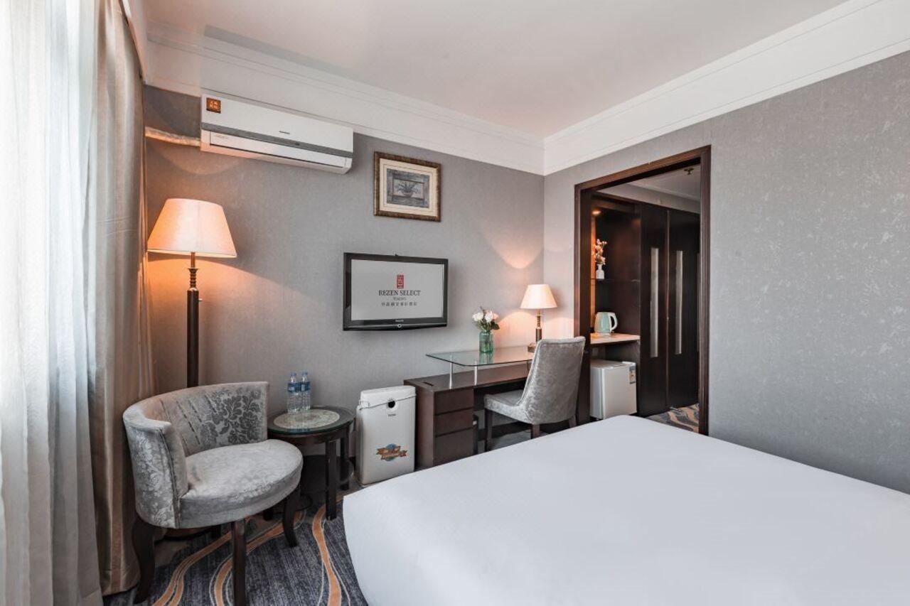 Rezen Select Huajing Hotel 4*